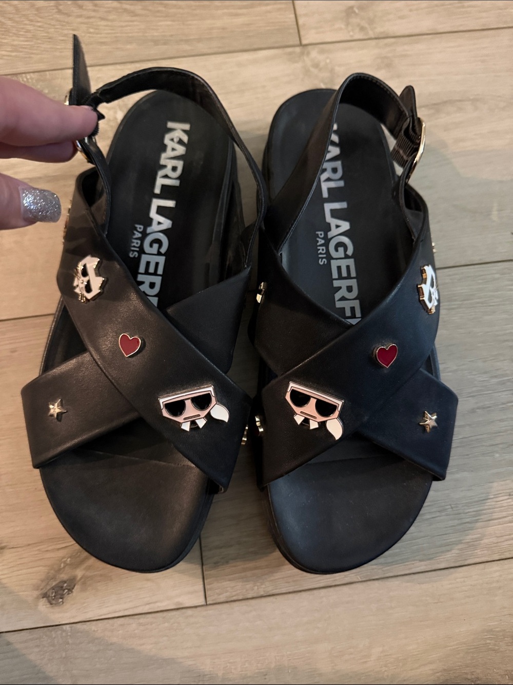 Karl Lagerfeld Black Cross-Strap Sandals with Red Heart & Gold Accents